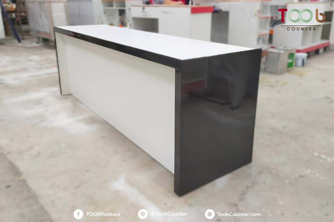 Real product example black white laminate reception counter front